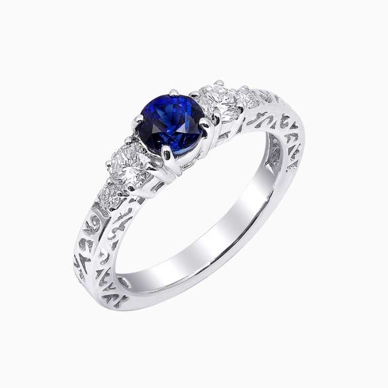 Blue Sapphire and Diamond Three Stone Ring
