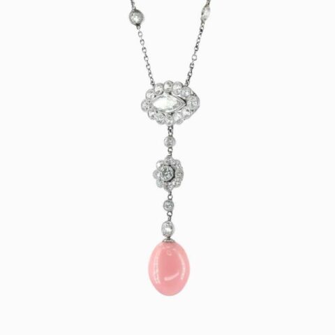 Natural pink conch pearl diamond pendant in Platinum