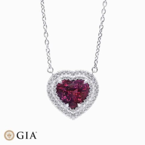 Natural red-purple sapphire diamond pendant in Platinum