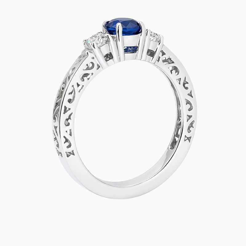 Blue Sapphire and Diamond Three Stone Ring - Image 2