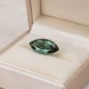 Natural marquise-cut alexandrite loose gemstone showcased in an elegant jewelry box