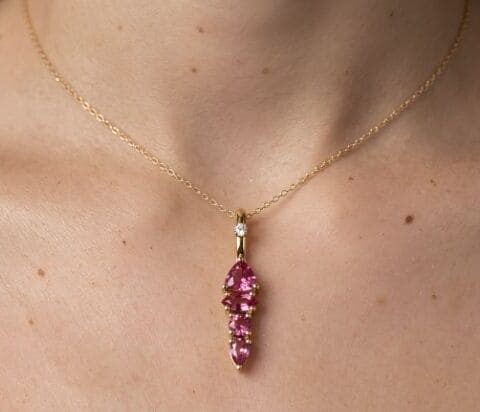Pink tourmaline gold pendant necklace with pear gemstones