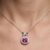 Pink sapphire diamond halo pendant necklace in white gold