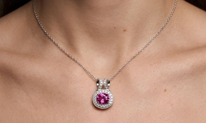 Pink sapphire diamond halo pendant necklace in white gold