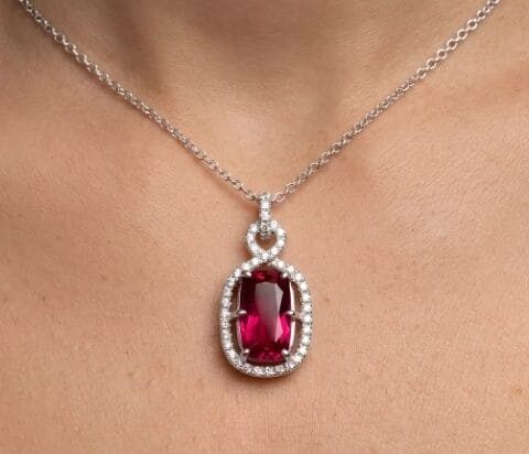 Rubellite diamond halo pendant necklace with cushion gemstone