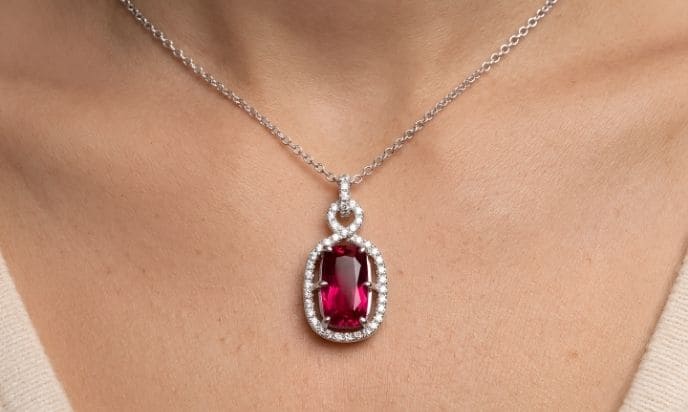Rubellite diamond halo pendant necklace with cushion gemstone