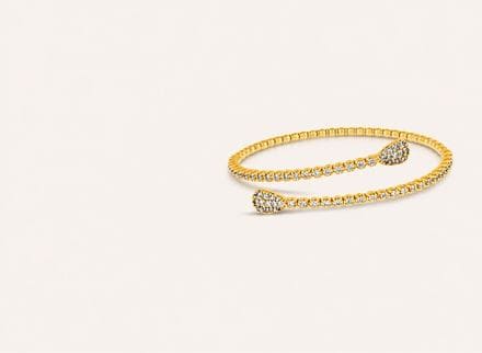 Diamond coil wrap bracelet in yellow gold