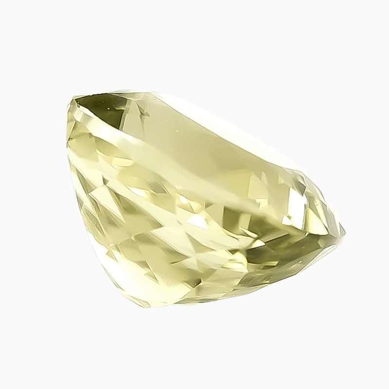 yellowish green changing to pinkish brown gemstone