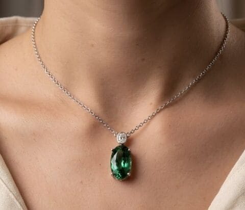 Green tourmaline diamond pendant necklace in white gold
