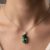 Green tourmaline diamond pendant necklace in white gold