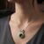 Tsavorite diamond pendant necklace with green gemstone