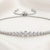 Graduated bezel-set natural diamond bolo bracelet with adjustable sliding clasp