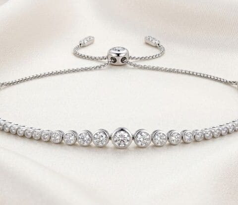 Graduated bezel-set natural diamond bolo bracelet with adjustable sliding clasp