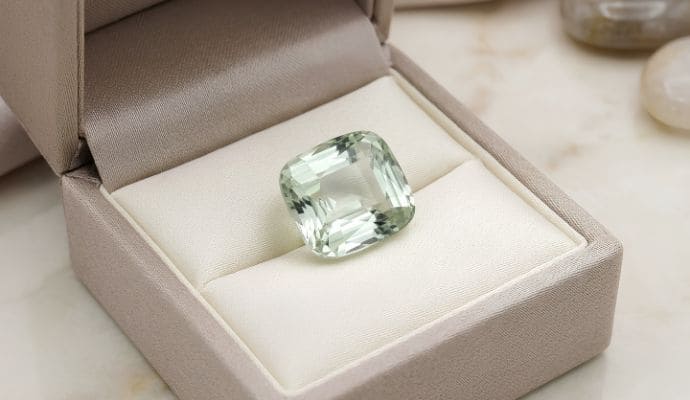 Natural 28.10 carat green beryl cushion-cut loose gemstone in jewelry box