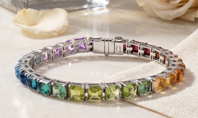 Rainbow gemstone tennis bracelet featuring multicolor square-cut gemstones in white gold