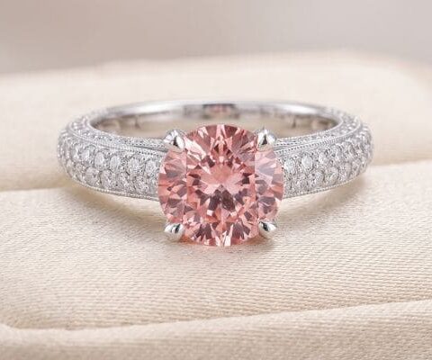 Natural emerald engagement ring in white gold with diamond halo