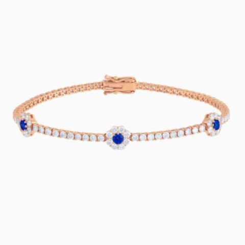 sapphire centered flower clusters rose gold