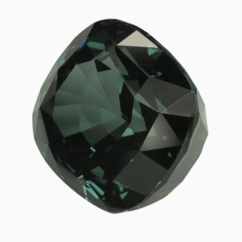 Natural dark blue green spinel gemstone