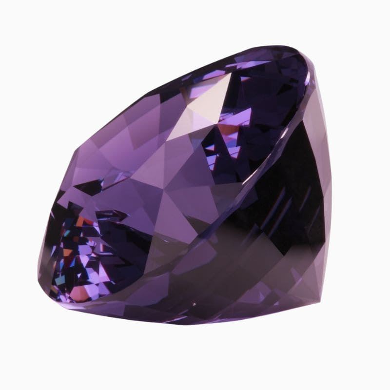 bluish violet changing to purple spinel gemstone