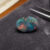 Black Boulder Opal oval gemstone with colorful play of color