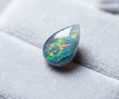 Black Boulder Opal pear shaped gemstone with colorful play of color