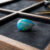 Black Boulder Opal pear shaped gemstone