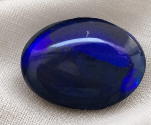 Black Boulder Opal oval gemstone