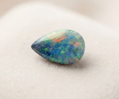 Black Boulder Opal multi color pear shaped gemstone