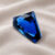 Blue Sapphire triangular faceted gemstone