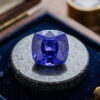Blue Sapphire cushion cut gemstone in jewelry box