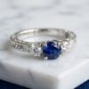 Blue Sapphire and Diamond Three Stone Ring