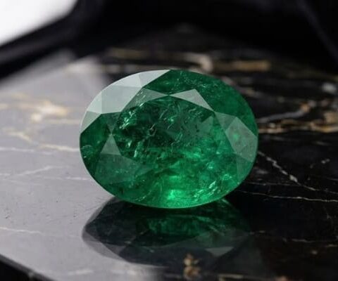 Modified Oval GIA Emerald Gemstone