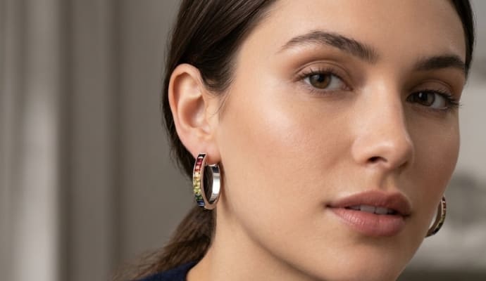 Woman Wearing Multicolor Channel Hoop Earrings – Stud Gems