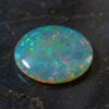 Natural Australian Crystal Opal oval cabochon with vivid green and multicolor flashes
