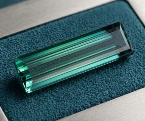 1. Indicolite Tourmaline blue green loose gemstone with step cut facets