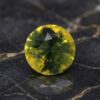 Natural bi-color sapphire round cut loose gemstone with yellow and green tones