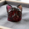 Natural bi-color tourmaline carved cat gemstone with deep red and pink tones