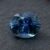 Natural blue sapphire gemstone with oval cut showing deep blue color and brilliant facets