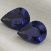 Natural blue sapphire matching pair on soft beige fabric