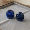 Natural blue sapphire matching pair on soft grey jewelry tray