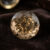 carats/ 1. Natural round brown tourmaline gemstone on dark velvet fabric