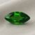Natural marquise cut chrome tourmaline gemstone on soft beige fabric