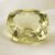 Natural cushion cut color change diaspore gemstone on soft cream fabric