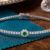 Tennis Bracelet with Emerald Centered Flower Clusters