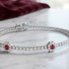 Tennis Bracelet with Ruby Centered Flower Clusters