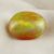 Natural Ethiopian opal with GIA report on soft cream fabric