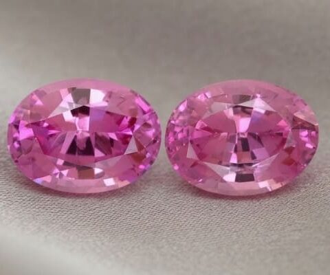 Natural pink sapphire matching pair, oval cut front view