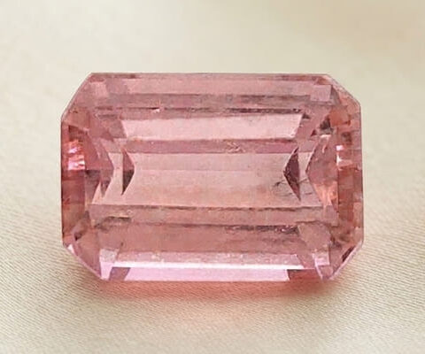 Natural imperial topaz gemstone, emerald cut front view