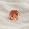 Natural imperial topaz gemstone, oval cut front view