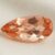 Natural imperial topaz gemstone, pear cut front view